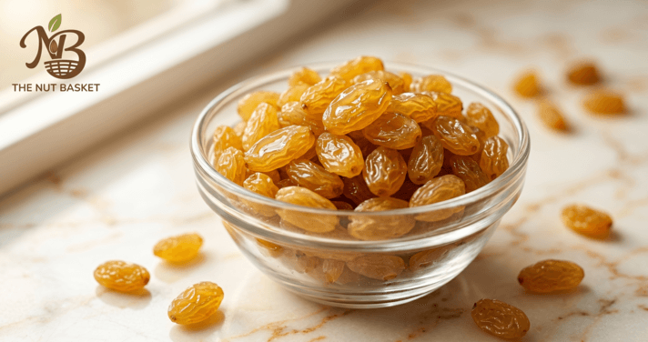 Golden raisins health benefits — plump kishmish in glass bowl